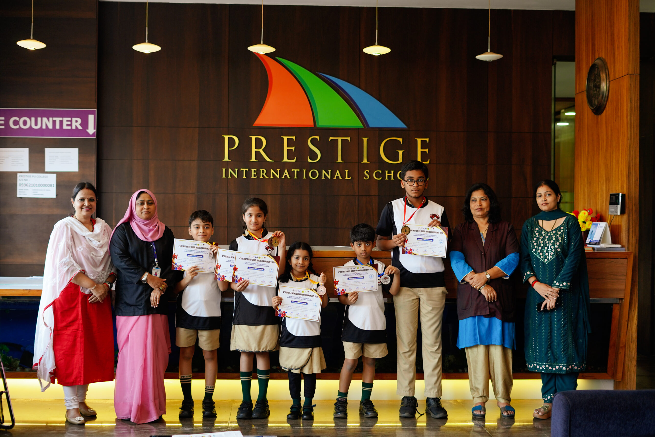 Student achievements at Prestige International School with certificates and awards