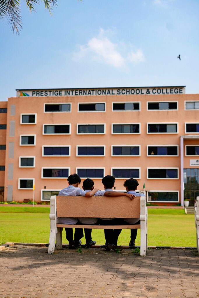 Students enjoying friendship moments at Prestige International School campus
